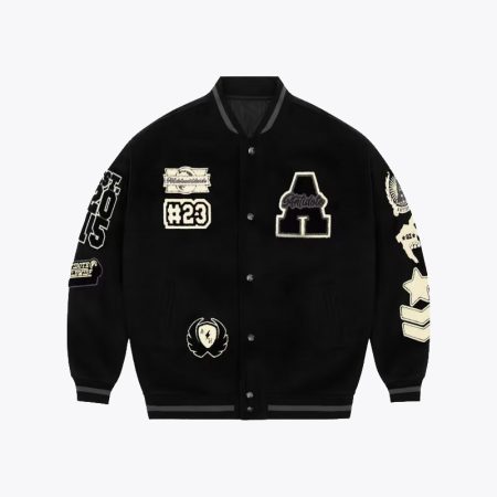 Black and white varsity jacket with embroidered patches and letterman design.