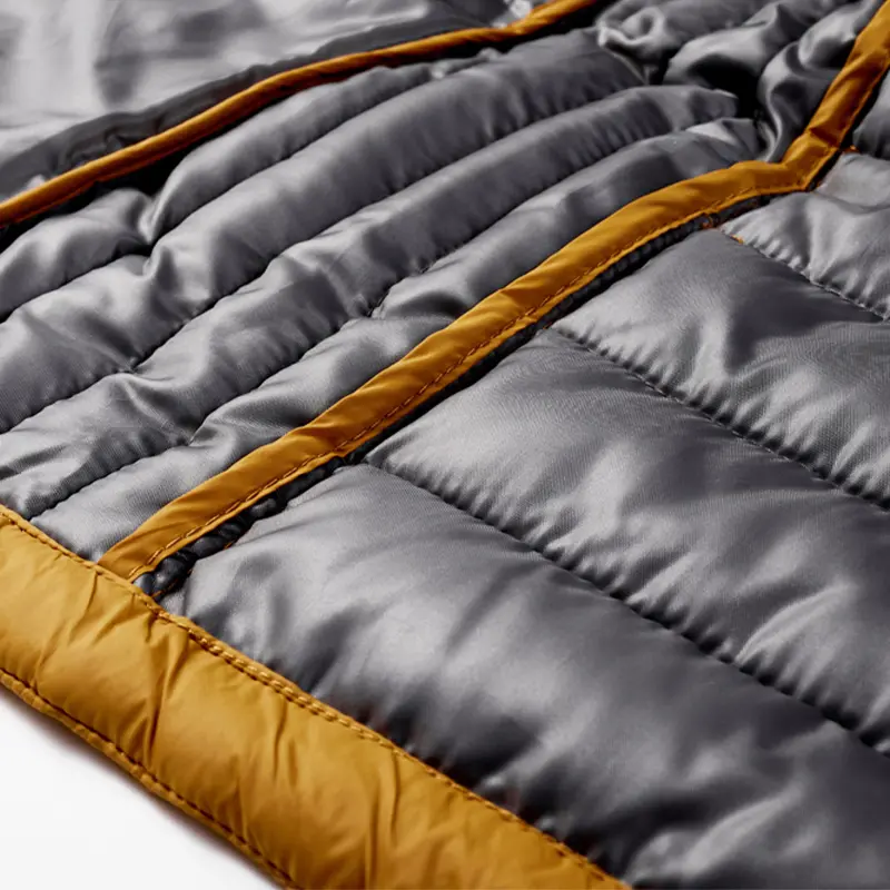 Close-up of Simmerui insulated puffer jacket quilting and lining, showing warm padded construction
