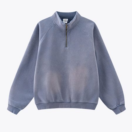 Blue quarter-zip vintage sweatshirt with ribbed cuffs and collar, front view
