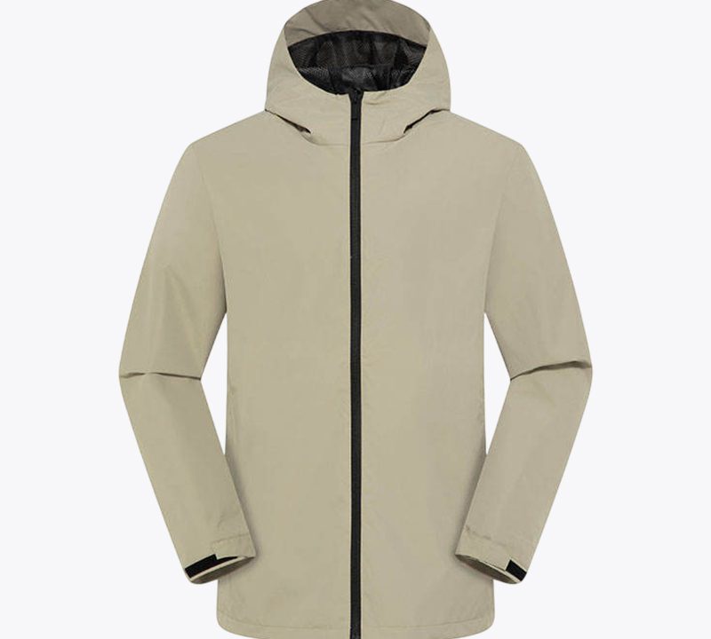 Khaki softshell jacket with a hood, front zipper, and black detailing on the sleeves and zipper, ideal for outdoor activities and casual wear