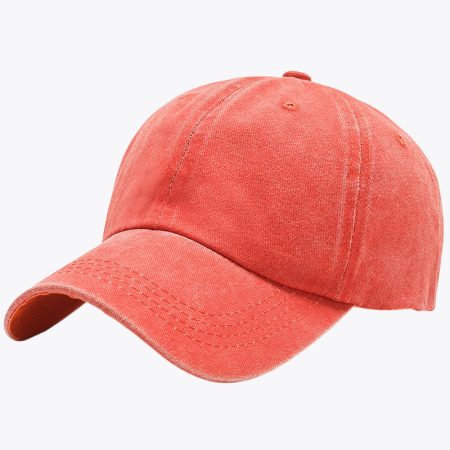 Vintage orange cotton adjustable unstructured dad hat with curved brim.
