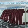 Outdoor apparel products hanging in a factory for retail distribution, built for long-term retail partnerships
