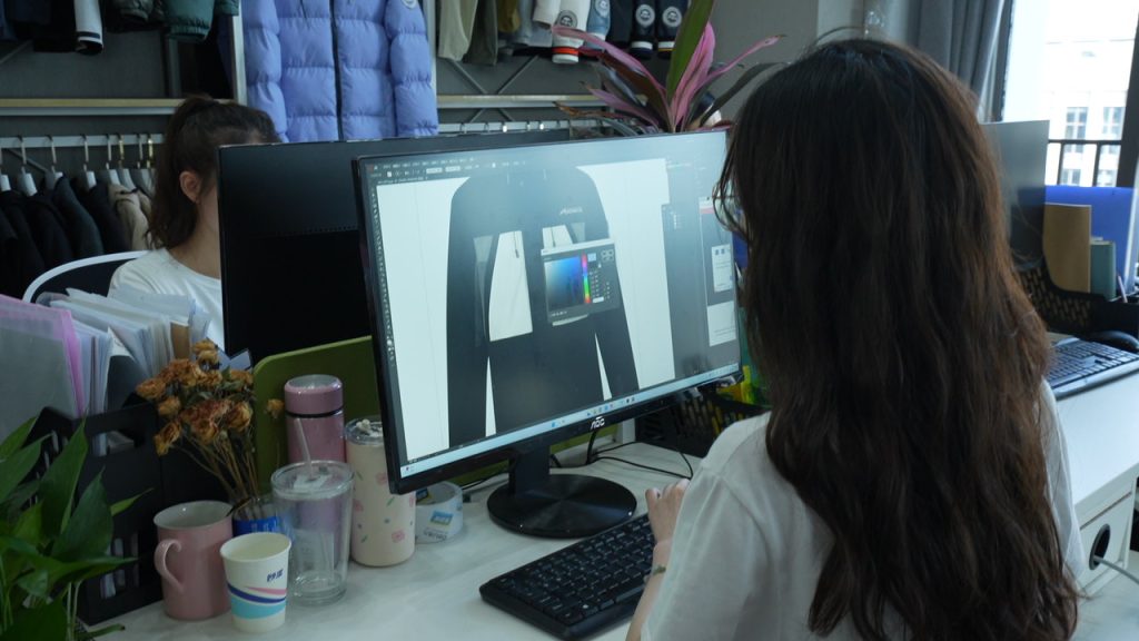Design team working on customization options for outdoor apparel