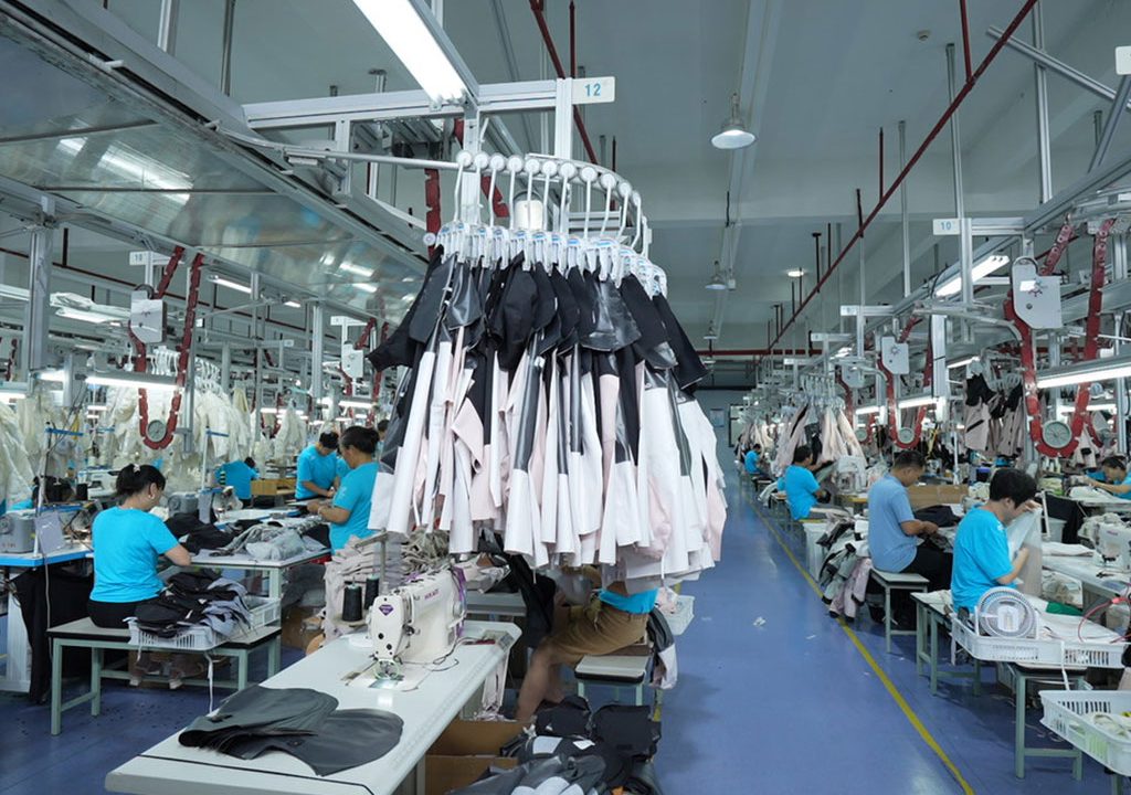 Outdoor apparel factory production line for scalable technical outerwear manufacturing