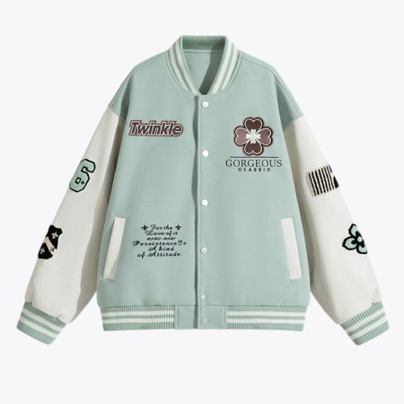 Front studio view of the Simmerui varsity style baseball jacket in pea green with contrasting black PU leather sleeves, featuring intricate letter and flower embroidery on the chest and sleeves, completed with striped ribbed collar and cuffs.