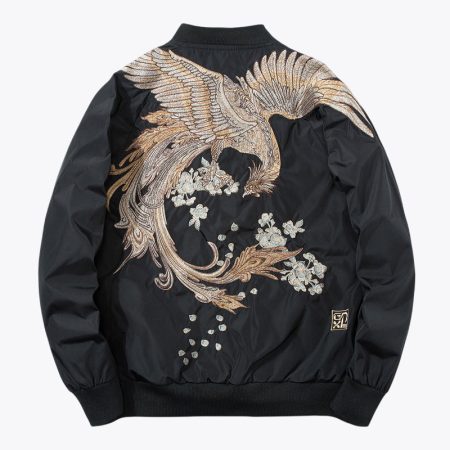 A full back view of the black Simmerui bomber jacket featuring an intricate, large-scale golden phoenix embroidery sprawling across the rear, accented with detailed floral patterns and traditional craftsmanship.