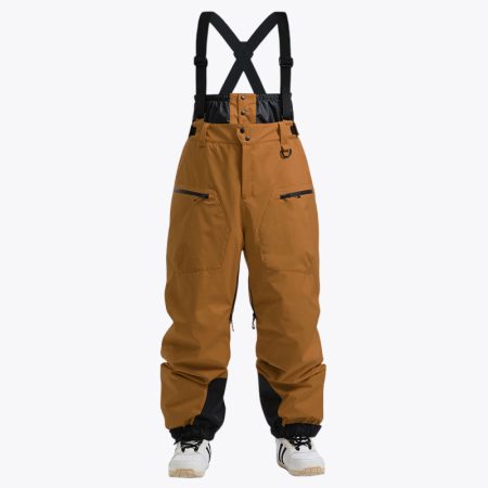 A front view of SimmerUI insulated baggy ski overalls in coffee color, featuring adjustable black suspenders, a high-waist design with button closure, and multiple tactical zippered pockets on the thighs for secure storage.