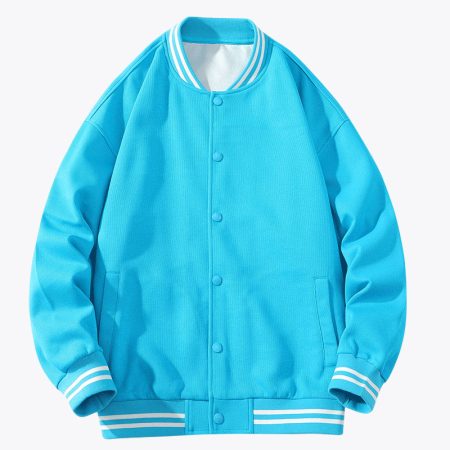 SimmerUI color block striped varsity jacket in light-blue with vibrant green striped ribbed collar, cuffs, and hem, featuring snap button closures and a relaxed streetwear silhouette laid flat.