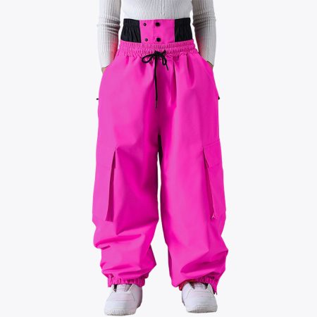 Front view of Simmer rose red insulated ski snow pants, featuring a high-waisted elastic waistband with black detailing, two large flap-covered cargo pockets on the thighs, and elasticized cuffs at the bottom for a secure fit over boots.