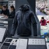 A comprehensive guide graphic showing 10 mistakes brands should avoid before apparel production, featuring design meetings, technical specifications, fabric swatch check sheets, and factory assembly lines.
