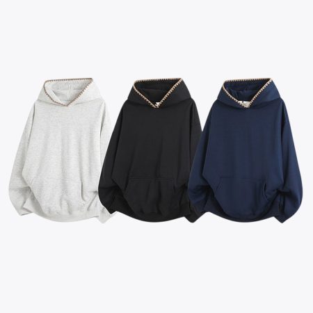 Three color variants of the Simmerui mens embroidered hooded pullover sweatshirt displayed side by side, including light grey, black, and navy blue, showcasing their cozy oversized fit and embroidered hood details.