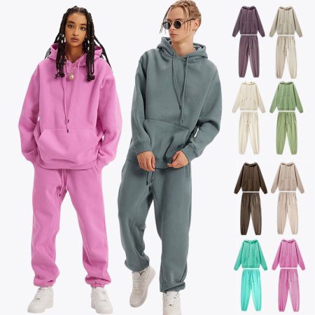 Lifestyle studio view of two models wearing the Simmerui hip hop thickened hoodie and sweatpants set in pink and slate green, alongside a color swatch sidebar displaying multiple available color options.