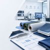 Fabric lab testing for OEM apparel production showing waterproof, breathable and durable fabric samples, testing equipment and performance reports