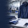 OEM garment manufacturing setup showcasing technical jacket with fabric swatches, tech packs, and trims, with production factory in background.